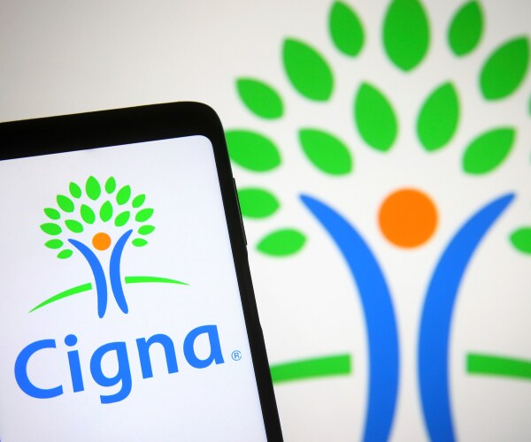 Cigna Raises Forecast, as Slow Medical Demand Curbs Costs