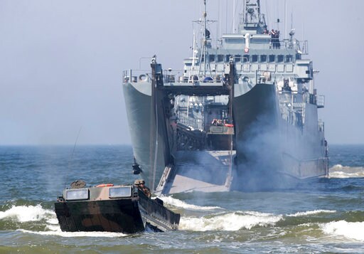 NATO Meets to Show Resolve over Russia, Paper over Divisions