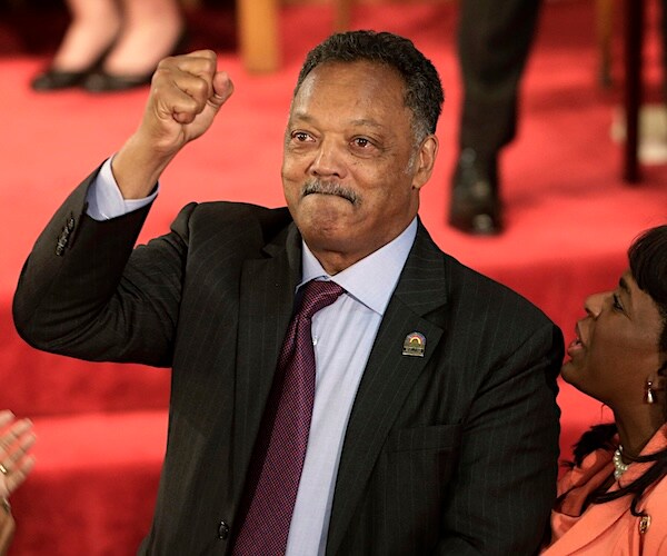 Jesse Jackson gestures