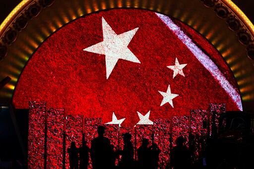 China's Communist Party Inserts Xi into Party Constitution