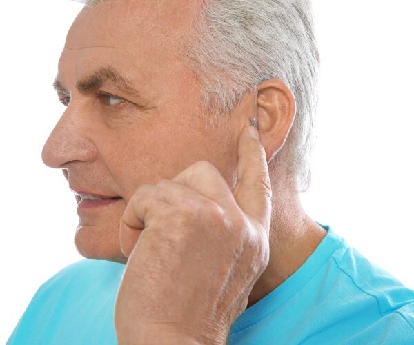 man with hearing aid