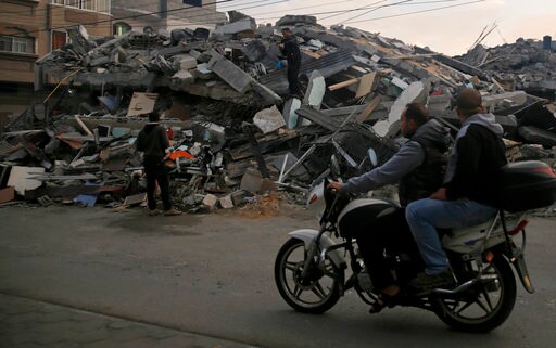 The Latest: Israeli Leader Says Hamas Begged for Cease-fire