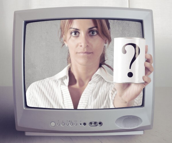 a television with a woman reaching out of the screen holding a card with a question mark on it