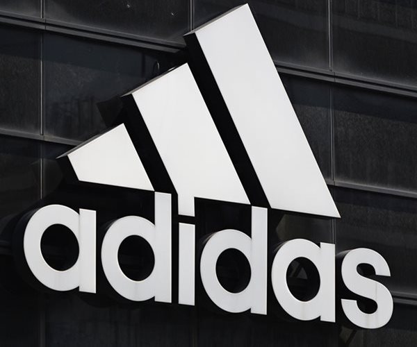 Adidas Raises Profit Outlook on Mitigated US Tariffs