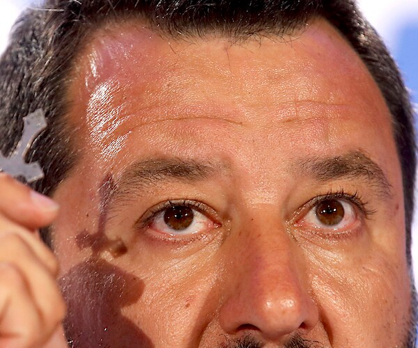 matteo salvini gestures in an extreme closeup