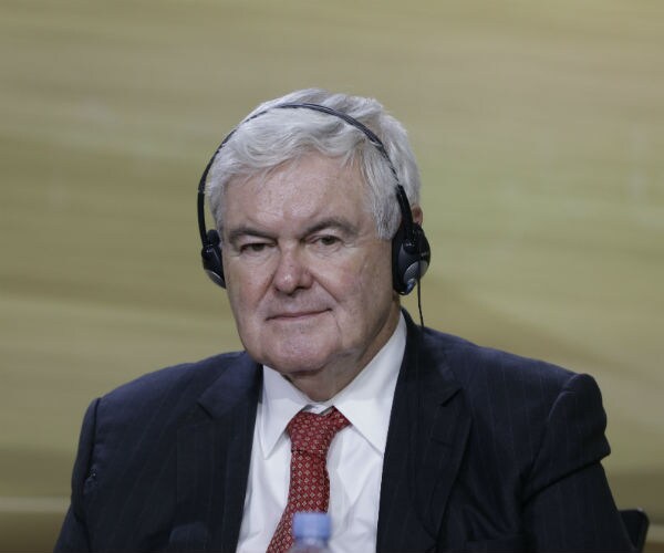 newt gingrich is shown wearing headphones