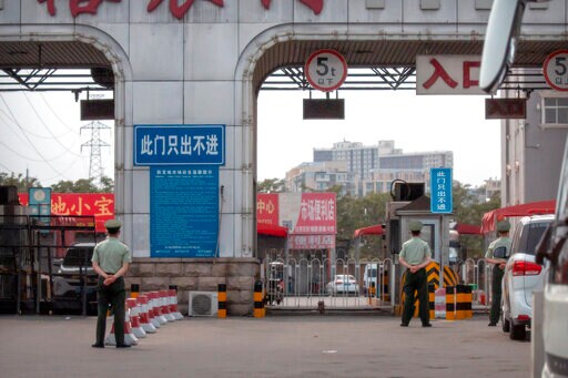 Beijing Closes Market, Locks Down Area in New Virus Outbreak