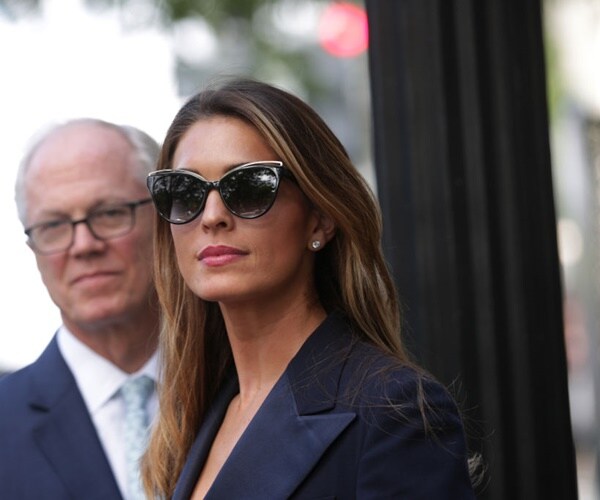 hope hicks wearing sunglasses, leaves an interview with the judiciary committee.