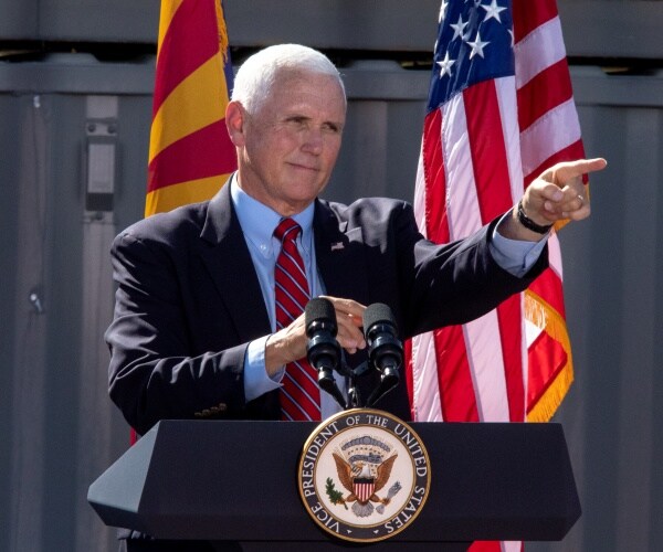mike pence points to crowd