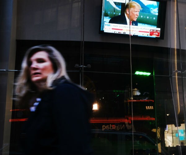 A television monitor shows President Donald Trump as the ongoing senate impeachment trial continues