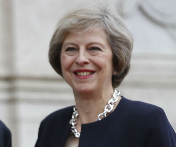 UK PM May to Hold Brexit Talks with EU's Juncker; Urges Party Unity