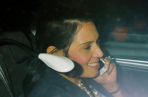 The Latest: UK Cabinet Minister Quits over Israel Meetings