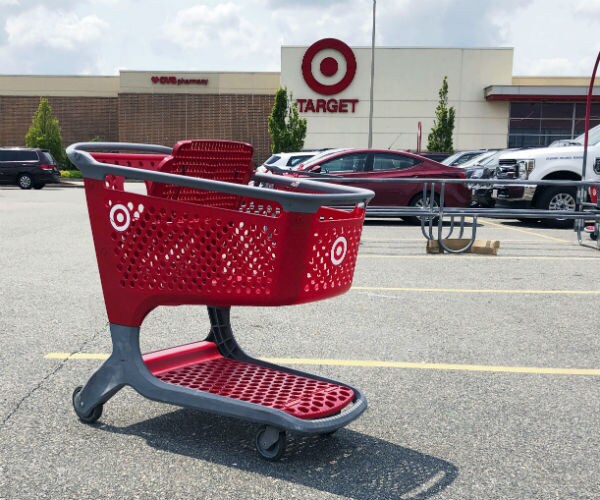 an empty shopping cart outside a target store