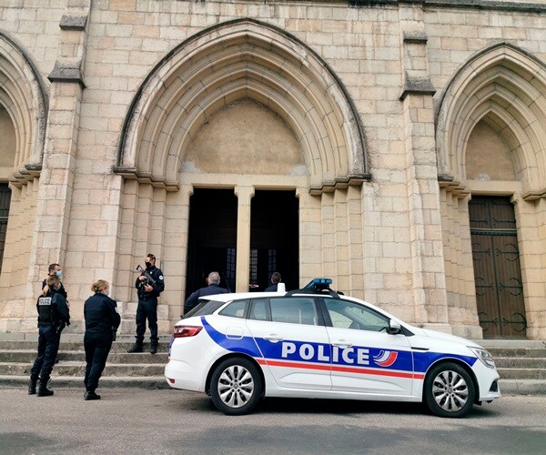 France: Suspect in Priest's Shooting Freed, Search Widens