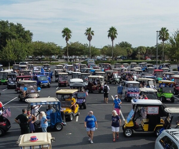 Biden Supporters Stage Villages Golf Cart Parade