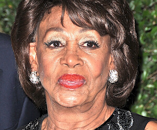 maxine waters scowls during a red-carpet appearance