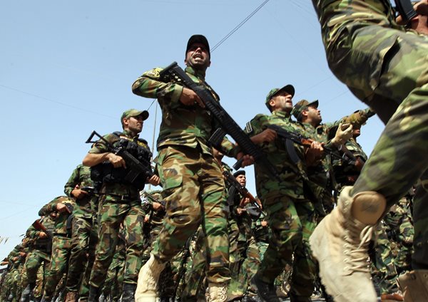 Shiite Fighters Parade as US Readies Iraq Diplomatic Push