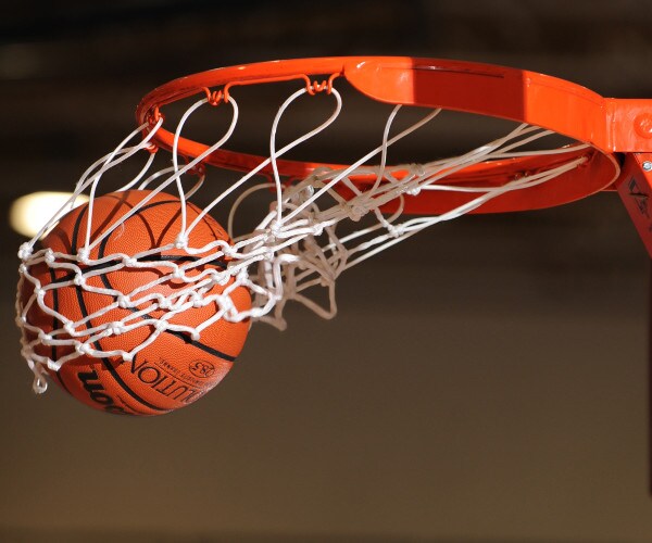 a basketball going through a hoop