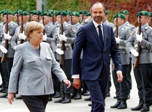 Germany's Merkel Backs French Reforms, Says Patience Needed