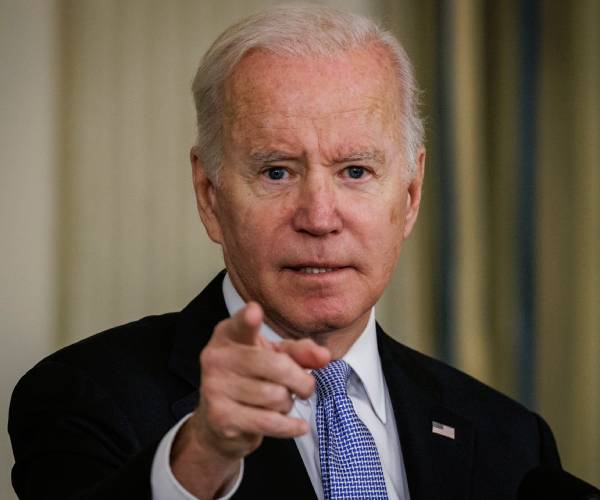 biden points his finger while speaking