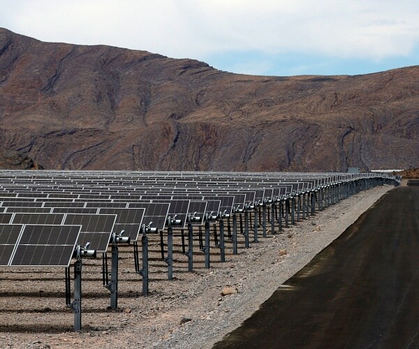 rows of solar panels in nevada dessert