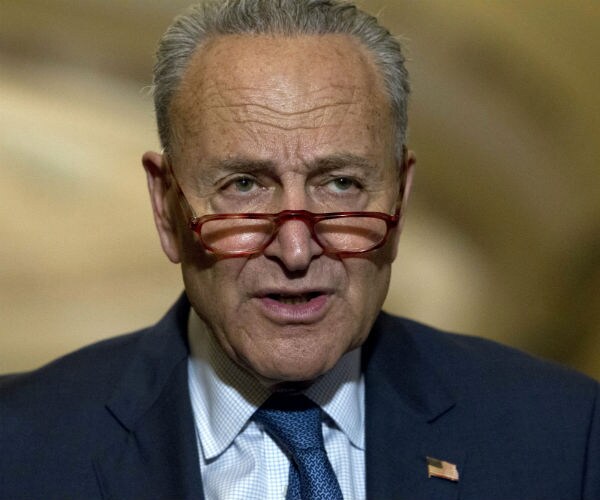 Senate Minority Leader Chuck Schumer is shown.
