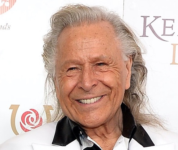 Canadian fashion mogul Peter Nygard smiles on the red carpet
