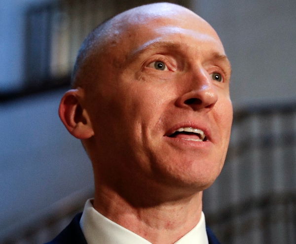 DOJ Reaches $1.25 Million Settlement With Trump Aide Over Russia Probe