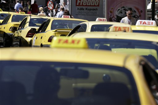 Taxes and More Taxes: Greeks Grapple with New Price Hikes