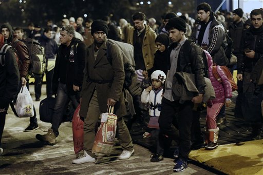 The Latest: France: 25 Migrant Networks Dismantled over Year