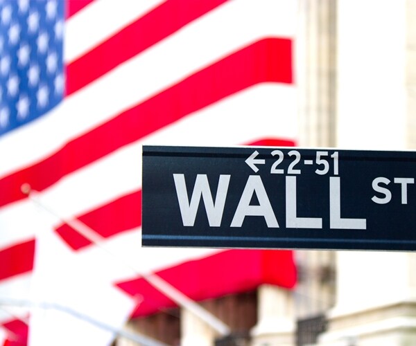 Wall Street Ends High-Volume Session Lower on Trade Jitters