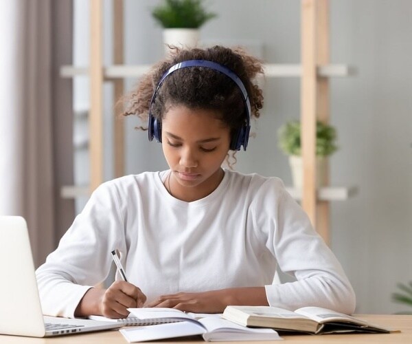 young girl doing homework