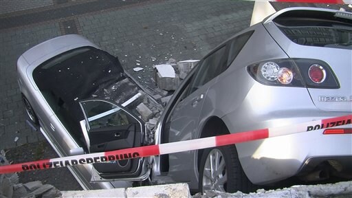 Germany: Driver Rams through Car Park Wall, Falls 10 Feet