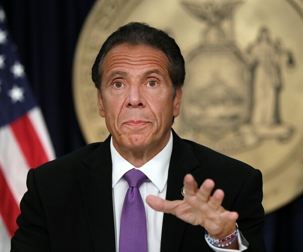 andrew cuomo hosts press event