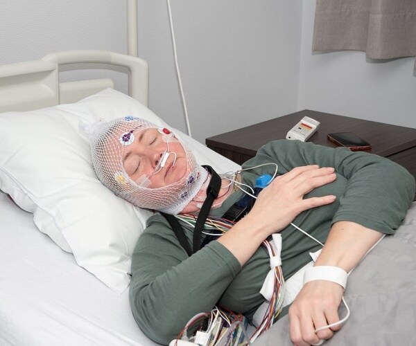 man undergoing sleep study