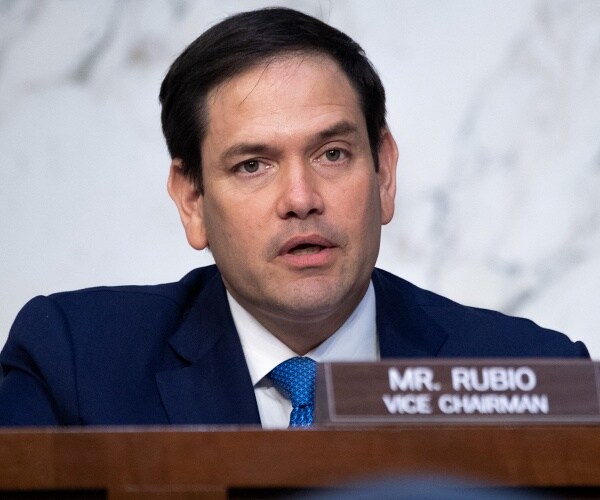 marco rubio sits in hearing
