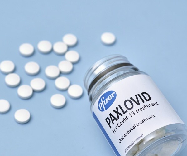 bottle of Pfizer's Paxlovid pills