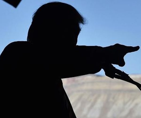 donald trump in shadowy silhouette