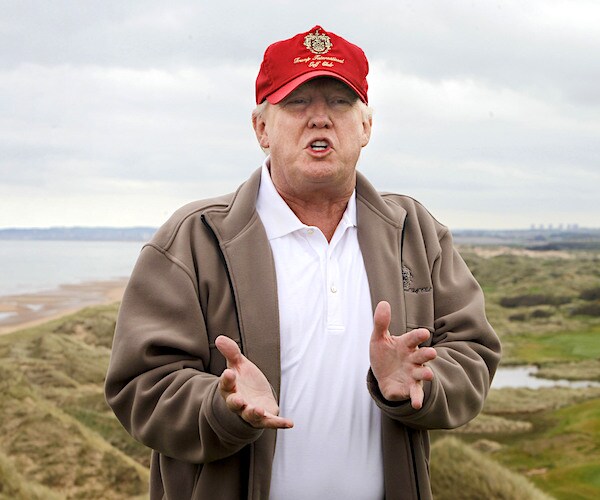 donald trump speaks to the media in scotland amid a fight over wind farms off the coast of his golf resort