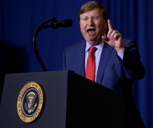 tate reeves is shown at a trump campaign event in tupelo, mississippi