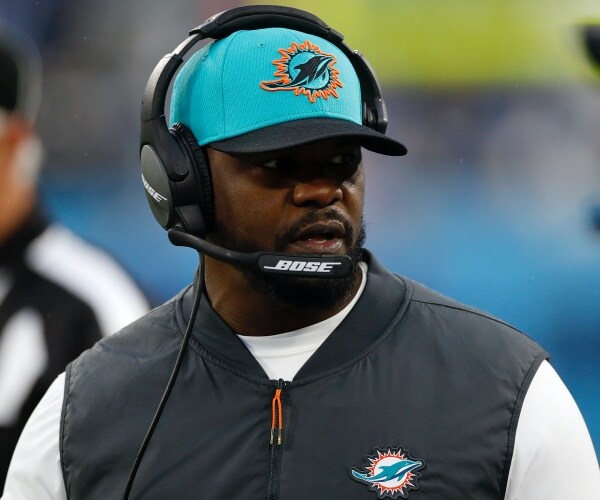 Brian Flores with headset on