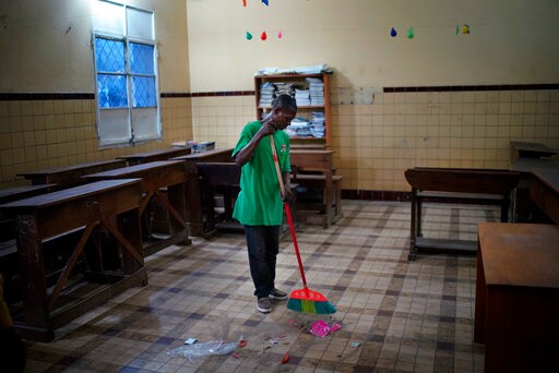 The Latest: Aid Group Suspends Ebola Work in Congo Protests