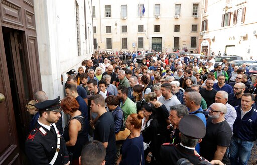 The Latest: Teens' Schools React to Officer's Rome Killing