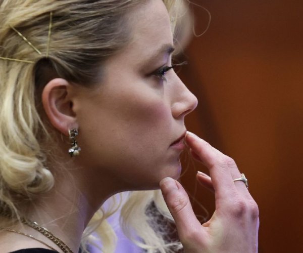amber heard waits before a jury verdict