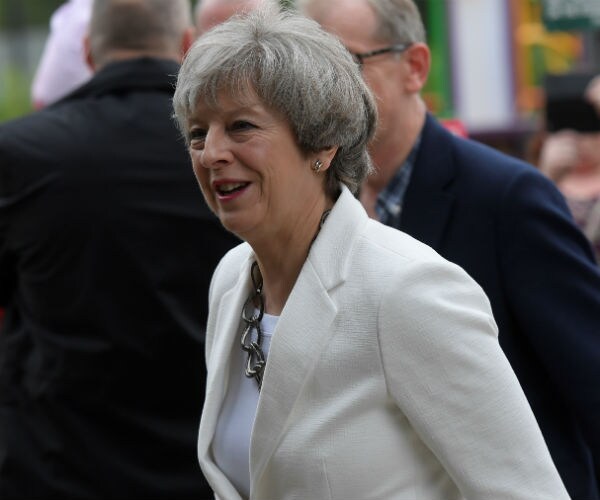 PM May Damaged Despite Polls Saying She'll Win UK Snap Election