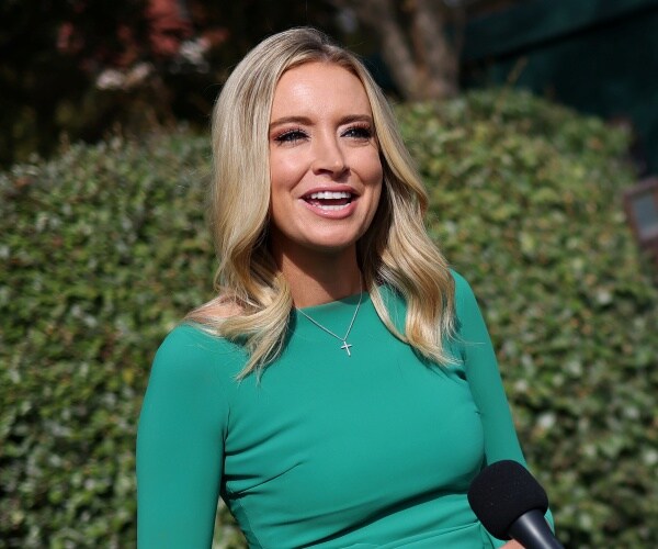 kayleigh mcenany stands in driveway