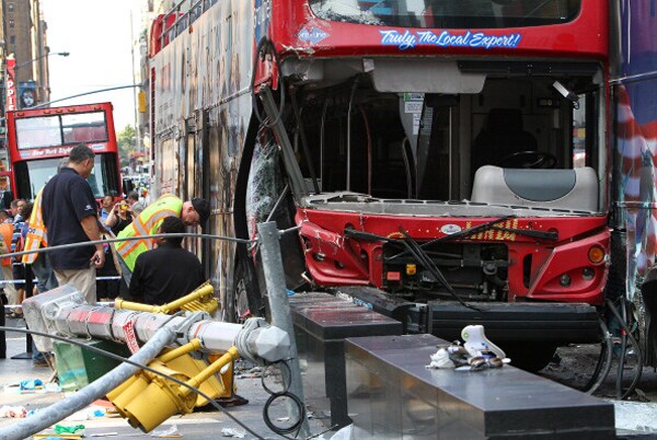 Tour Buses Collide: 2 Double-Deckers Crash in Times Square, Injuring 14
