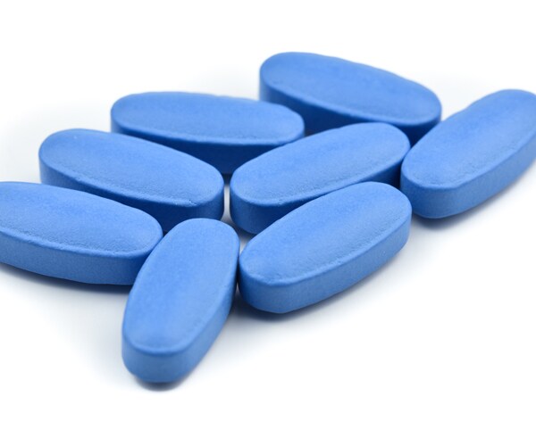 blue viagra pills on a white background