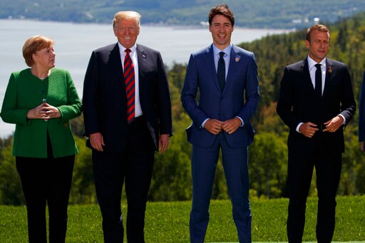 The Latest: Trump Attends G-7 Gender Equality Breakfast