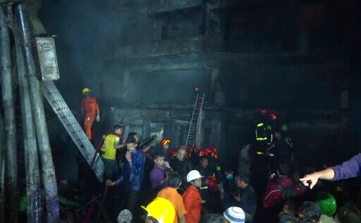 The Latest: Fire in Bangladesh's Capital Kills at Least 69